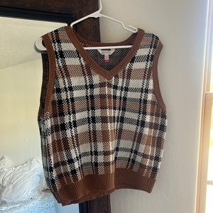 This is a sweater vest, soft material, great to layer